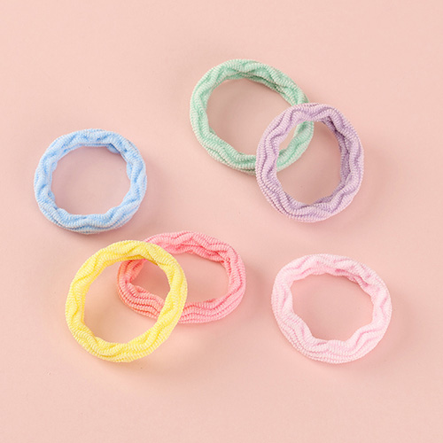 Twenty Colored Jacquard Rubber Bands In A Tube
